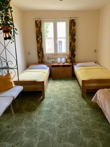 En eller flere senge i et værelse på Hof Dahnsdorf