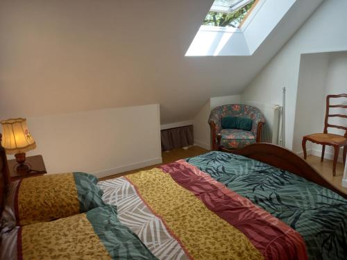 Ένα ή περισσότερα κρεβάτια σε δωμάτιο στο Maison vacances 8 voyageurs