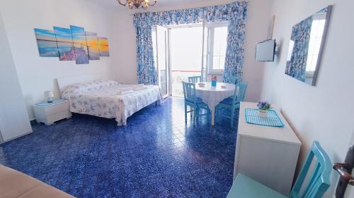 Ένα ή περισσότερα κρεβάτια σε δωμάτιο στο Casa del Mare