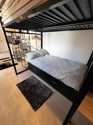 Katil dua tingkat atau katil-katil dua tingkat dalam bilik di Casa Enna