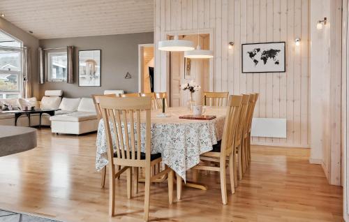 a dining room with a table and chairs at Nice Home In Sjølund With Wifi in Sjølund