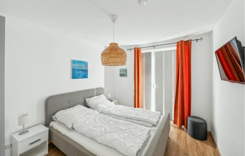 Ένα ή περισσότερα κρεβάτια σε δωμάτιο στο Seewolke