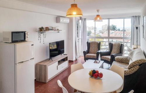 A television and/or entertainment centre at Pet Friendly Apartment
