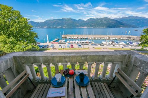 a balcony with a view of a marina at Residenza Oleandro Lake View Luino Center in Luino