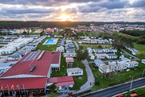 an aerial view of a small town at sunset at Bungalow Martins Nazaré Land`s Hause in Pataias