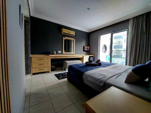 Ένα ή περισσότερα κρεβάτια σε δωμάτιο στο Summer rose hotel