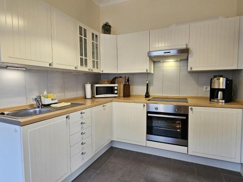 Nhà bếp/bếp nhỏ tại Ferienhof SchilfMeer - Fewo "Seepferdchen"