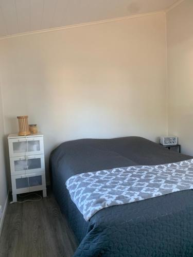 Postel nebo postele na pokoji v ubytování Lakeland BoxCabin
