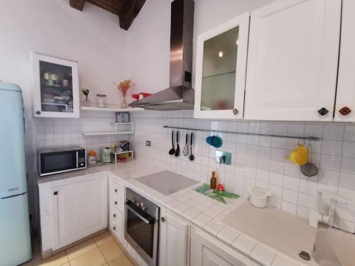 Küche/Küchenzeile in der Unterkunft Casetta panoramica Ariccia