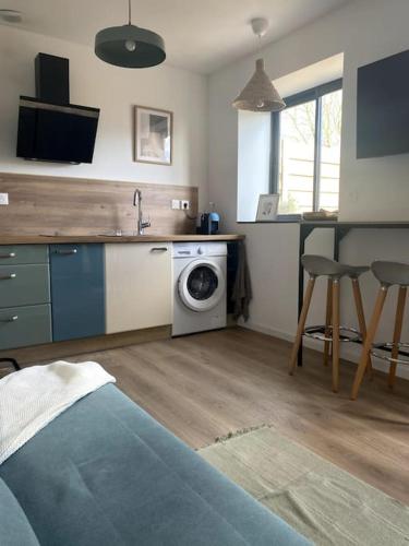 Entre ville et campagne appartement cosy avec parking et terrasse Wood