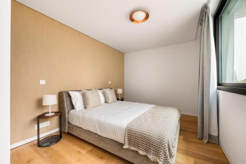 Cama ou camas em um quarto em Mirabilis Apartments - LX Living