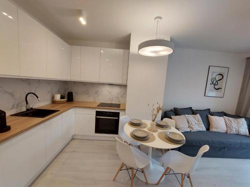 A kitchen or kitchenette at Harmony Pearl Apart