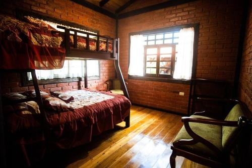 Poschodová posteľ alebo postele v izbe v ubytovaní Quinta Jessenita