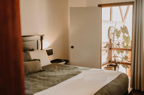 Cama o camas de una habitación en Misty Mountain Manor