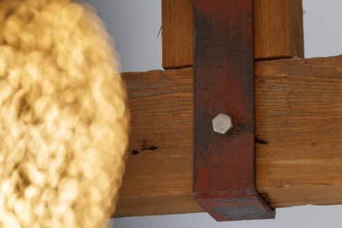 a close up of a piece of wood with a ball at Cozy Downtown Loft in Bradford in Bradford