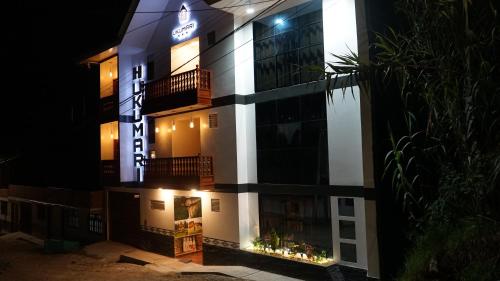 a hotel at night with lights on it at Ukumari Hotel in Chachapoyas