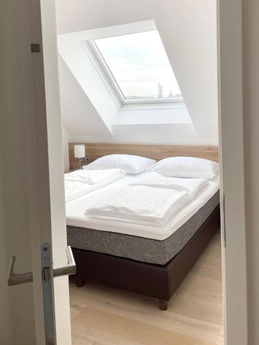 Postel nebo postele na pokoji v ubytování Reinisch Apartments