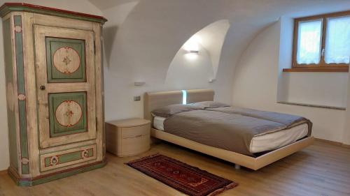 Ένα ή περισσότερα κρεβάτια σε δωμάτιο στο Casa Micheli