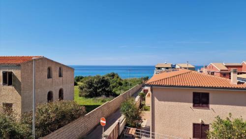 a view of the ocean from a building at L'onda marina in Castelsardo