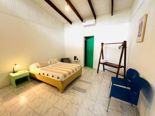 Postel nebo postele na pokoji v ubytování Hotel Exotic Lodge