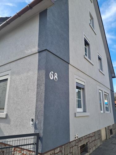 a building with the painted on the side of it at Husic Immobilien und Handwerkerservice in Rimbach