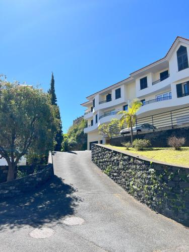 an empty street in front of a building at Sun Hills Panoramic Views in Funchal