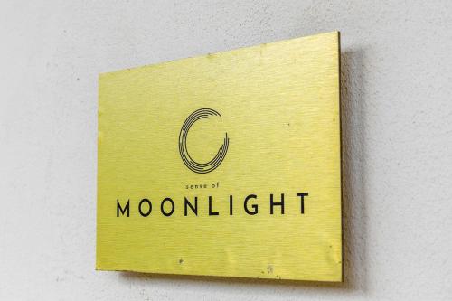 a sign with the letter c on a wall at SENSES Boutique Hotel & Apartments in Kralendijk