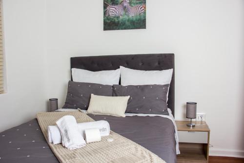 Katil atau katil-katil dalam bilik di Botha Villa Lodge Goodwood