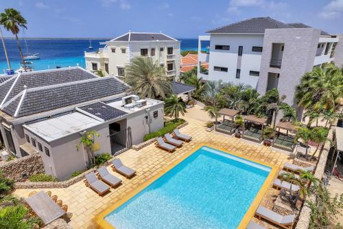an aerial view of a villa with a swimming pool at SENSES Boutique Hotel & Apartments in Kralendijk
