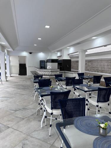 Restorāns vai citas vietas, kur ieturēt maltīti, naktsmītnē Enseada Premium Suítes