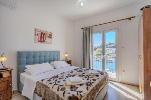 Postel nebo postele na pokoji v ubytování Harbour View Kassiopi