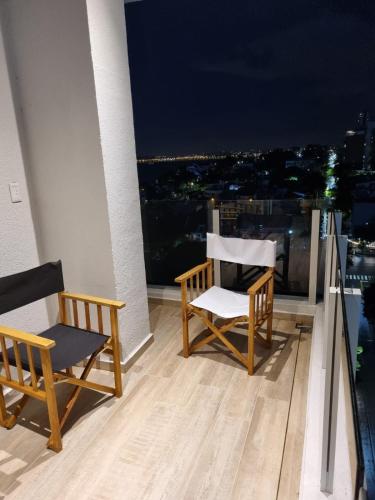 Balkoni atau teres di Departamento nuevo 2 habitaciones 2 baños y balcón 95m2 Piso alto sobre la costanera