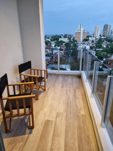 Balkoni atau teres di Departamento nuevo 2 habitaciones 2 baños y balcón 95m2 Piso alto sobre la costanera