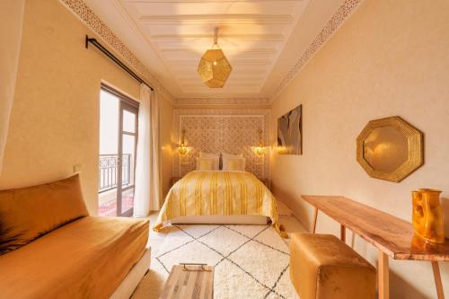 Postel nebo postele na pokoji v ubytování Riad Dar Arwa