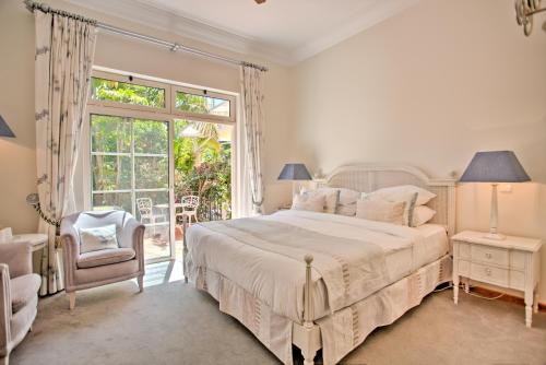 Ένα ή περισσότερα κρεβάτια σε δωμάτιο στο Quinta Jacintina - My Secret Garden Hotel