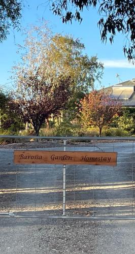 a sign for a garden in a home stay at Barossa Garden Homestay in Williamstown