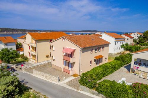 Apartments with parking space Barbat, Rab - 22584