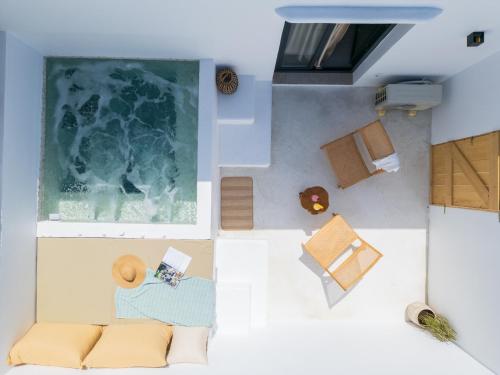 an overhead view of a living room with a couch at Electra Suites & Spa in Perivolos