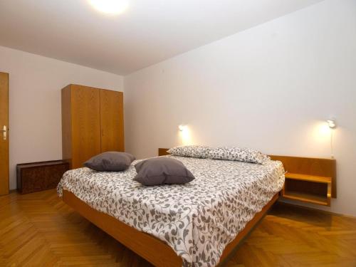 Katil atau katil-katil dalam bilik di Ferienwohnung für 8 Personen ca 120 qm in Stancija Vinjeri Novigrad, Istrien Istrische Riviera