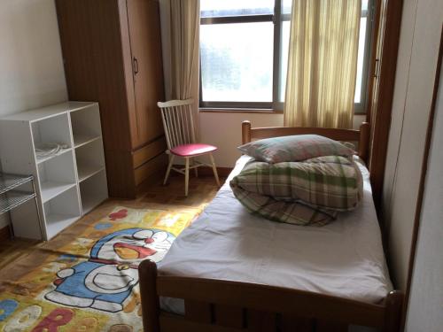 Ένα ή περισσότερα κρεβάτια σε δωμάτιο στο Ichigo Sou - Vacation STAY 15143