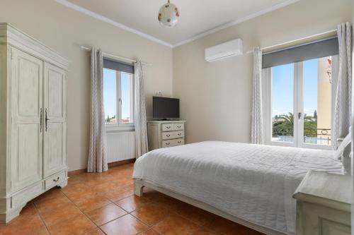 Ένα ή περισσότερα κρεβάτια σε δωμάτιο στο The Residence
