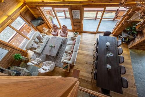 an overhead view of a living room in a cabin at Penthouse spa access , 6 bedroom, 6 baths by Jolidi in Nendaz
