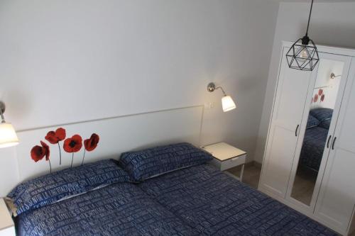 Gulta vai gultas numurā naktsmītnē Ferienwohnung für 6 Personen ca 65 qm in Madrid, Madrid