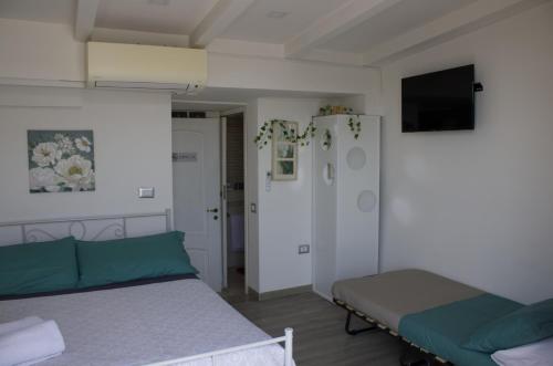 Postel nebo postele na pokoji v ubytování Casa sul Serapeo