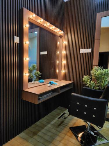 a bathroom with a sink and a mirror at Sun Shine Home by Ipoh Maju Stay in Ipoh