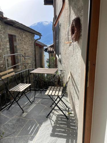 a balcony with chairs and tables on a building at Villa Sophia in Gerra