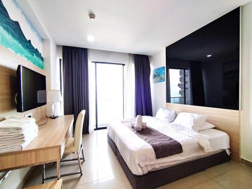 Voodi või voodid majutusasutuse Genting SunriseColdInn2R2B AT Ion Delemen toas