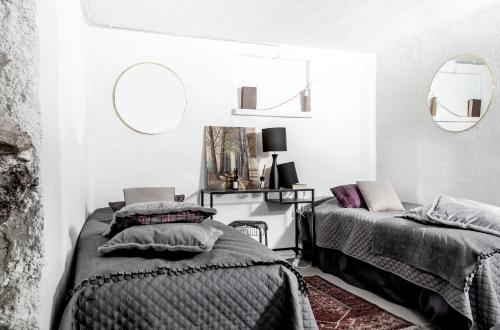 Säng eller sängar i ett rum på Vivante Basement Accommodation