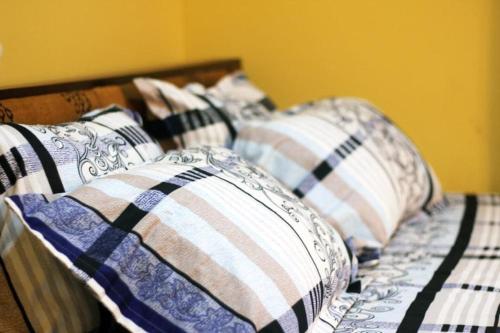Ein Bett oder Betten in einem Zimmer der Unterkunft Friendly Family - Amazing 1-bedroom Apt. (Deka)