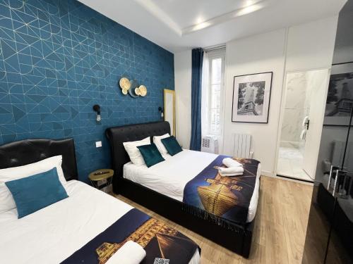 Posteľ alebo postele v izbe v ubytovaní 156 - Urban YSL Flat in Montorgueil